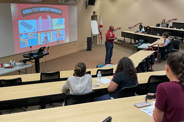 "students in lecture hall"